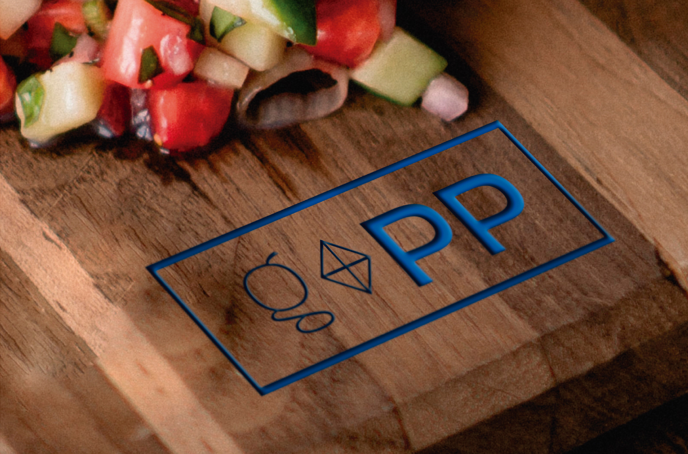 Tabla de madera con el logotipo de Papalote Guateque